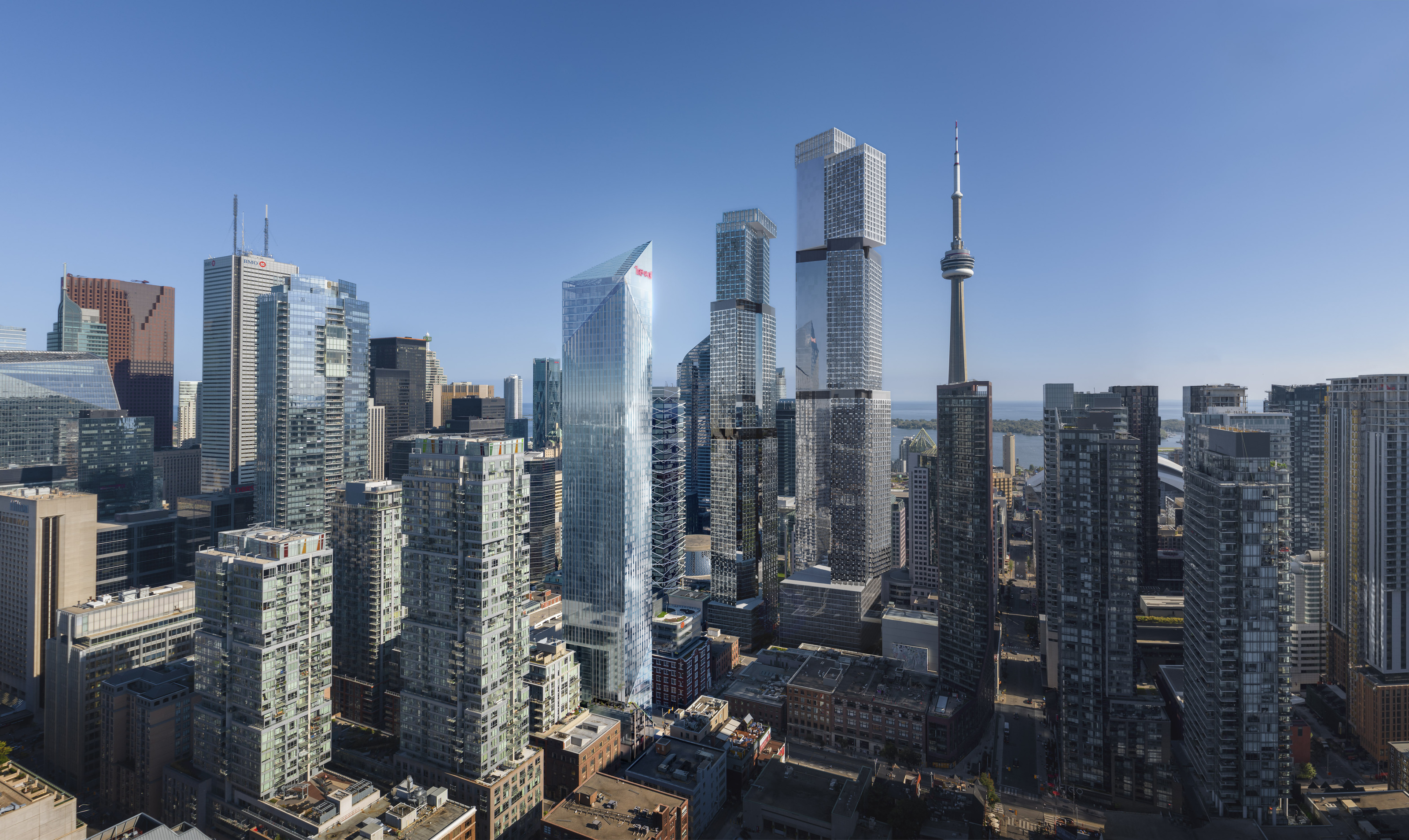 Daylight aerial of Freed Hotel and the Toronto skyline